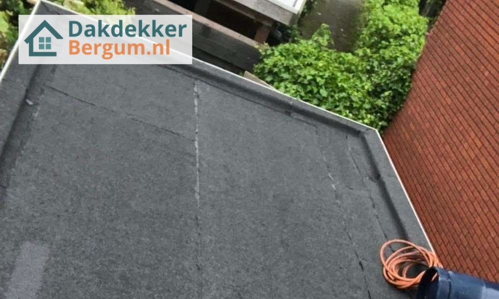 Wat kost een plat dak herstellen in Bergum?